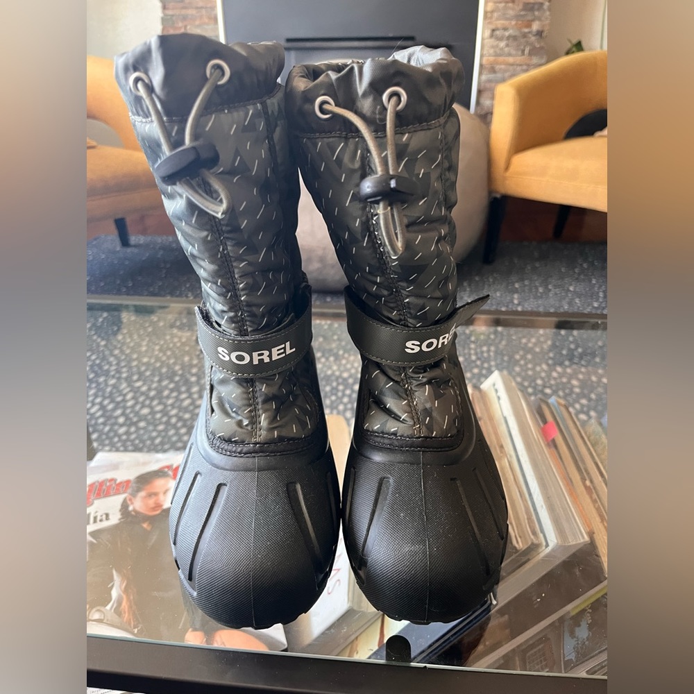 Sorel kids boots. Brand new. Never worn.